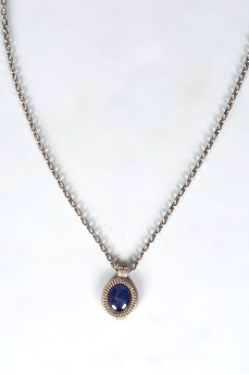 A pendant with a steel chain