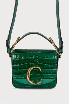 Leather emerald bag with tag