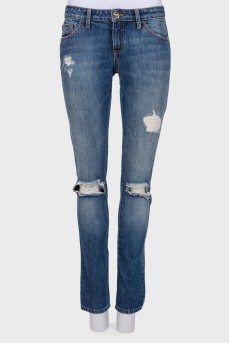 Jeans with decorative slots