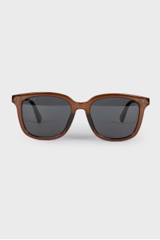 Brown frame sunglasses with tag