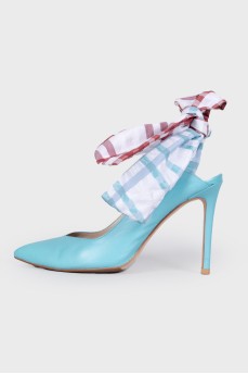 Blue shoes with a checkered bow