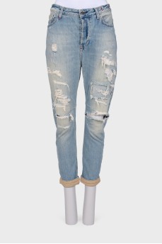 Jeans with the effect of torn and shabby