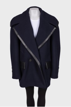 Blue coat with leather inserts