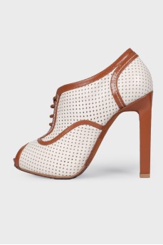 Perforated peep toecap ankle boots
