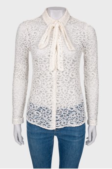 Lace blouse with slogan on the back