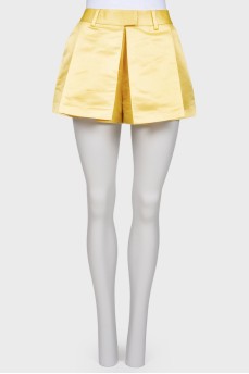 Yellow pleated shorts