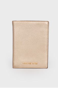 Golden wallet with brand logo