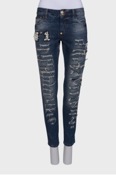 Jeans with pearls and ripped effect
