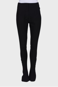Black trousers with hooks at the bottom