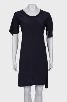 Dark blue dress with asymmetry at the bottom