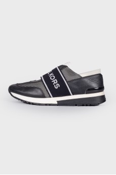 Black and white sneakers with logo
