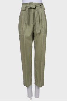 Green trousers with belt