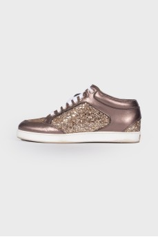 Sneakers with gold sequins