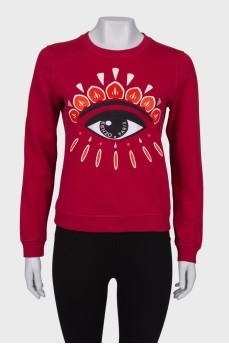 Red jumper with embroidery
