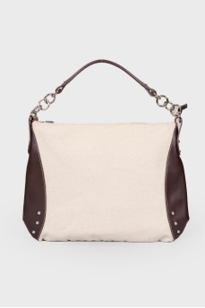 Textile and genuine leather bag