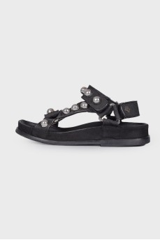 Black sandals with metal inserts