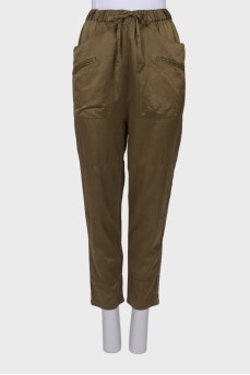 Khaki trousers with sequins