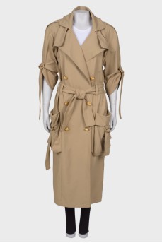 Trench coat with strap sleeve