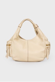 Leather bag with side pockets