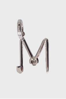 Metal pendant "M" with tag