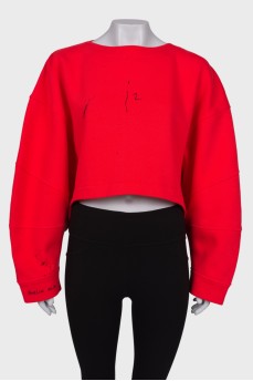 Red sweatshirt with back zip