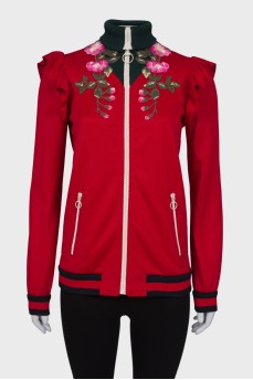 Red jacket with embroidery at the collar