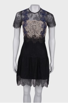 Lace dress with ruffles at the bottom
