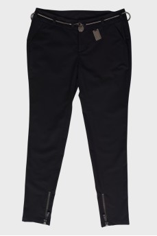 Black trousers with metal belt
