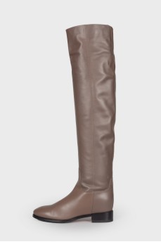 Low-heeled leather over the knee boots