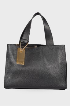 Black leather bag with mirror insert