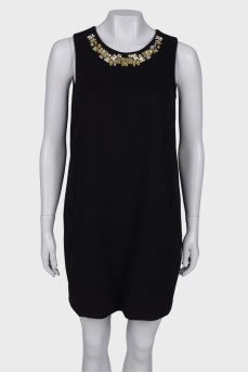 Black dress with rhinestones on the chest