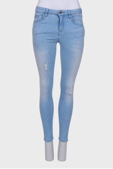 Light blue ripped effect jeans