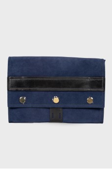 Dark blue clutch bag with tag