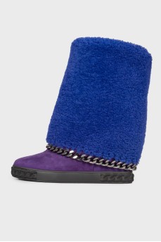 Insulated uggs on a hidden wedge