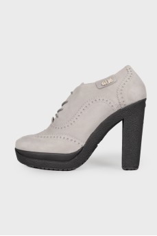 Gray perforated ankle boots