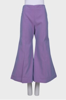 Flared trousers with tag