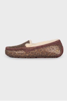 Loafers in print with fur
