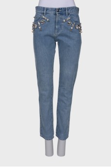 Blue jeans decorated with rhinestones