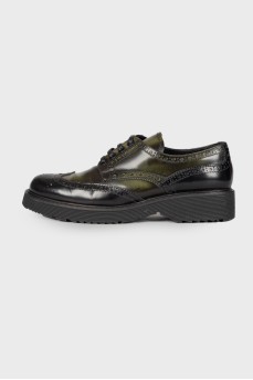 Black and green leather brogues
