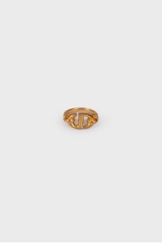 Golden ring with brand logo