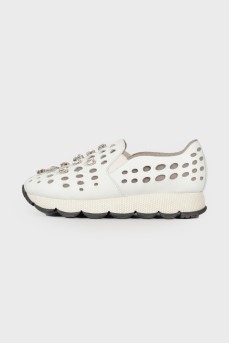 Leather sneakers with perforations and rhinestones