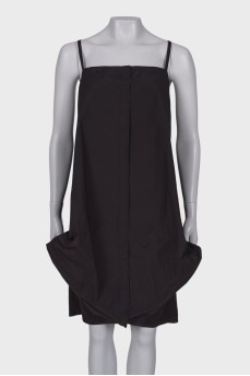 Black dress with asymmetric seam