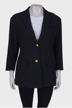 Navy blue jacket with golden buttons