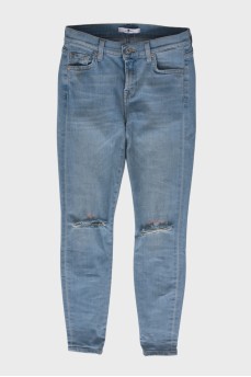 Blue jeans with ripped effect