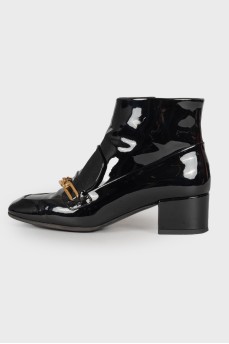 Patent leather boots with chain
