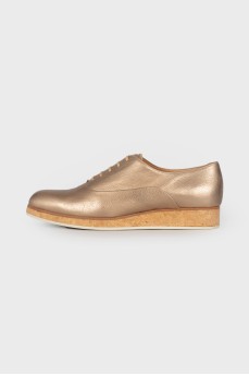 Gold platform shoes