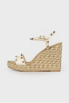 Sandals with woven wedges