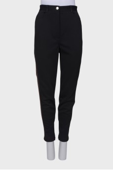 Trousers with brand logo