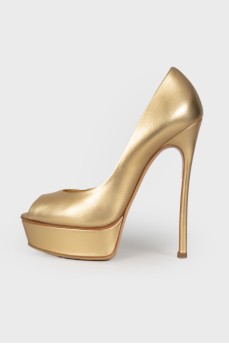 Gold peep toe shoes