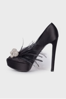 Textile shoes with rhinestones and feathers